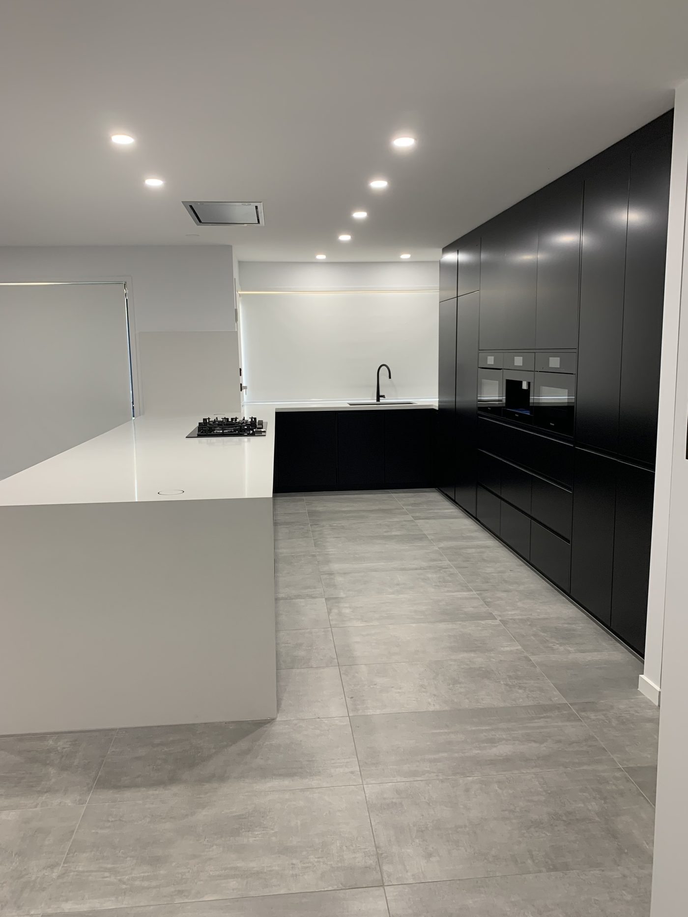 2-pac polyurethane finish — modern black kitchen